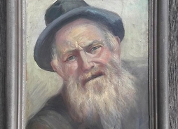 obraz na desce przedstawia starszego mężczyznę z brodą w kapeluszu