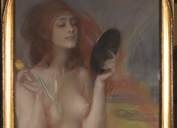 Portret nagiej rudowłosej kobiety przegldającej się w lustrze